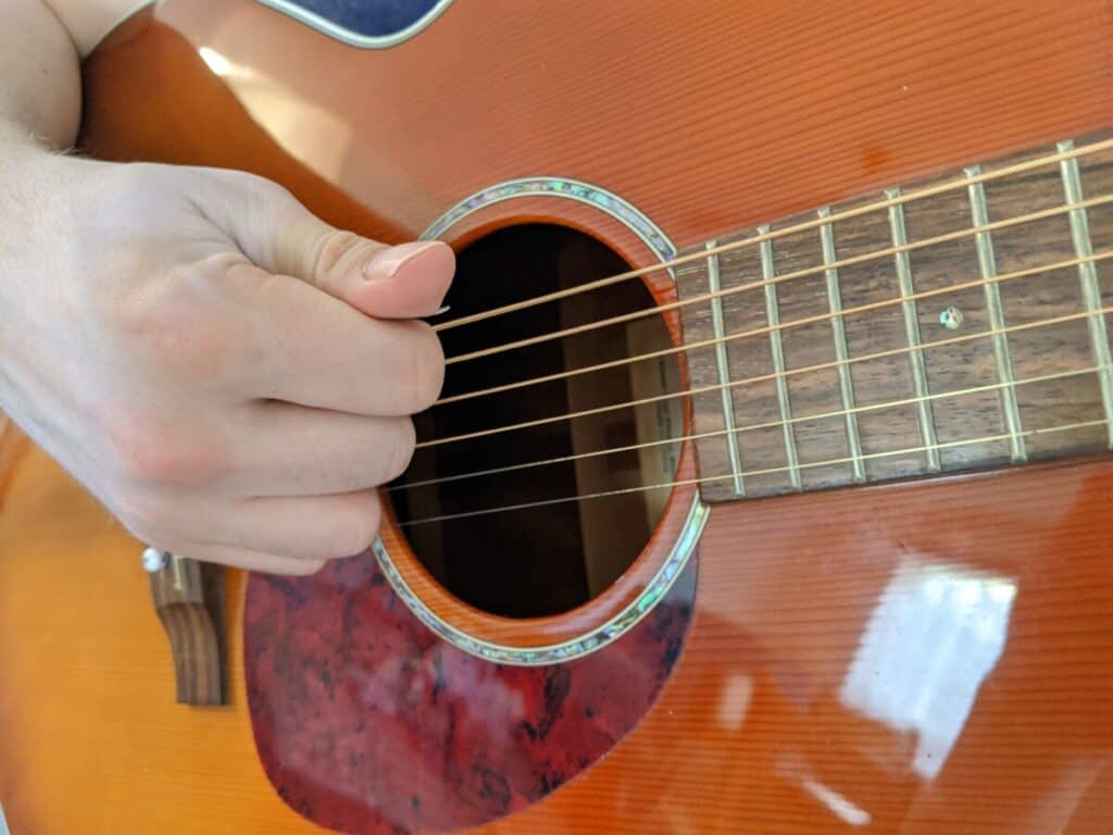 Picking guitar deals strings