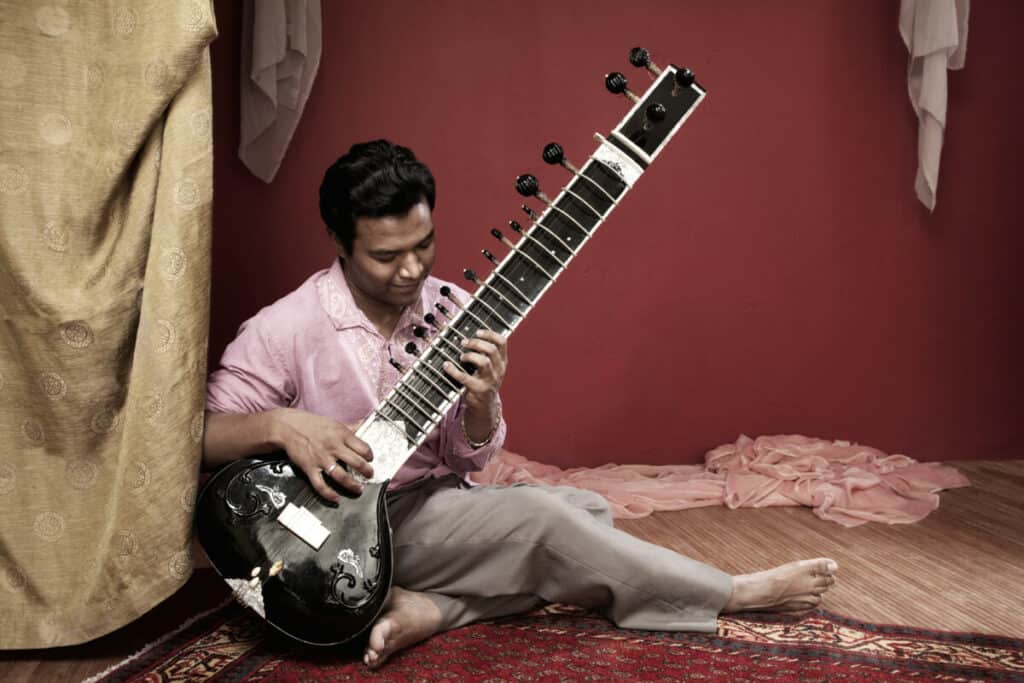 Someone playing the Sitar
