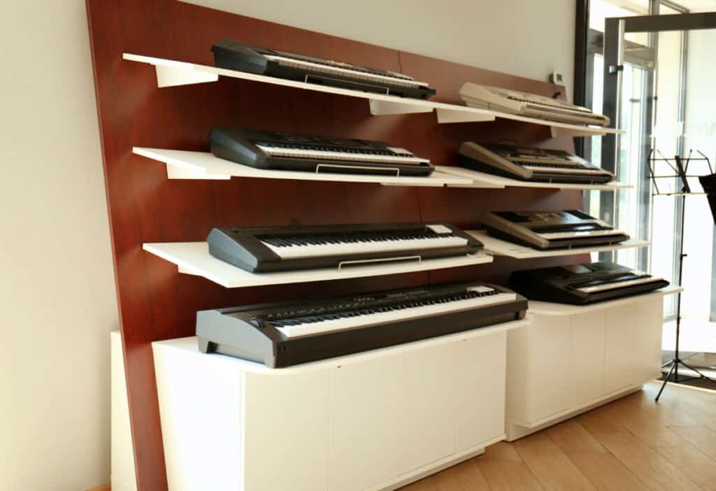 Several Synthesizers on the shelf